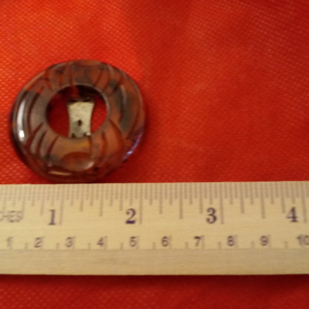 Apple juice bakelite dress clip